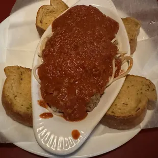 Regular spaghetti add meatballs. Comes with garlic bread (very soft &amp; tasty!)