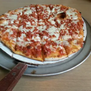 Pepperoni Pizza, meat is in little cubes instead of slices. All crust is thin.