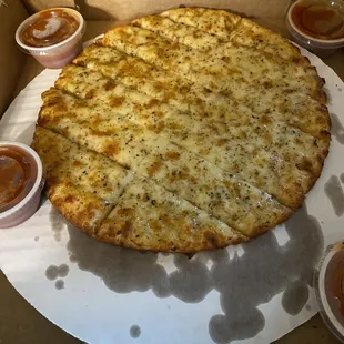 a large cheese pizza in a box