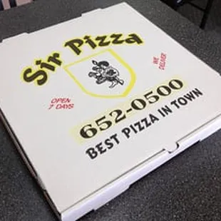 a pizza box on a table
