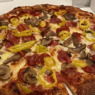 Pepperoni, mushrooms, and banana peppers. Requested it cooked a few extra minutes. Turned out great!