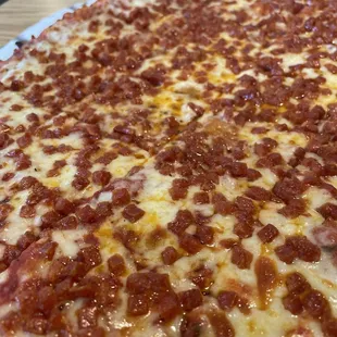 a pizza with pepperoni and cheese