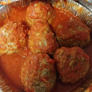 Meatball appetizer in marinars. One meatball =$2