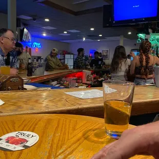 a person sitting at a bar