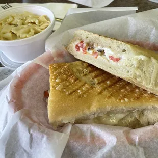 a sandwich and a side of macaroni and cheese