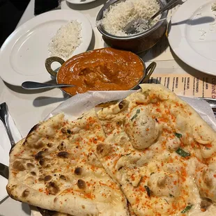 101. Garlic Naan 60. Butter Chicken. 39. Lamb Korma.