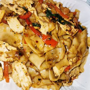 a plate of stir fried noodles
