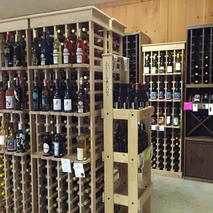 a wine rack full of wine bottles