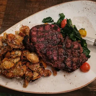 Prime Ribeye Heirloom Tomatoes and potatoes