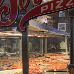 Side window looking at the pizza pies