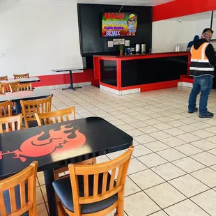 a man standing in a restaurant