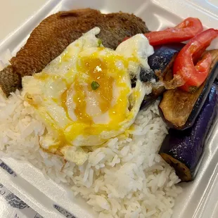 a meal in a styrofoam container