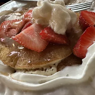 Pancakes with strawberry and whipped cream