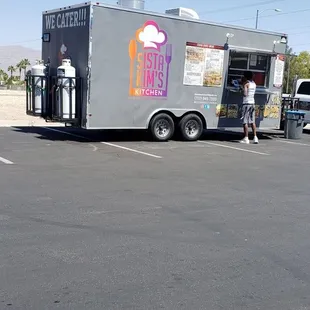 a food truck parked in a parking lot