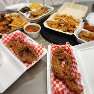 Fried ribs (yes FEIED RIBS) seasoned &amp; juicy, crispy catfish &amp; some of the best wings! sides: greens, Mac &amp; cheese, &amp; sweet potatoes!