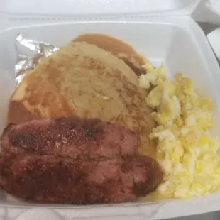 a meal in a styrofoam container