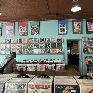 a man looking at records