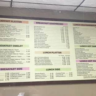 the breakfast menu on the wall