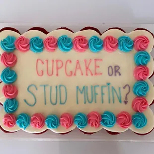 We also make cupcake cakes. This one is a red velvet cupcake gender reveal cupcake cake.