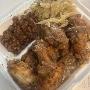 Nasty smothered chicken, rice, baked beans, and cabbage