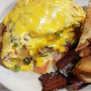 Really Stuffed Omelette,  side of bacon, and Rye toast