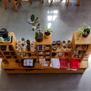 Sisters Coffee brand items for sale seen from the 2nd floor.