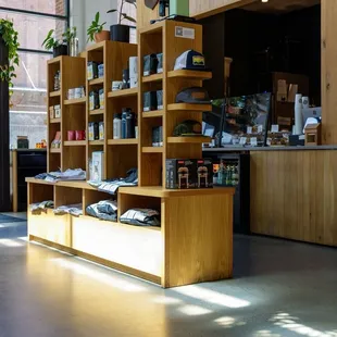 Sisters Coffee brand items for sale upon entering.