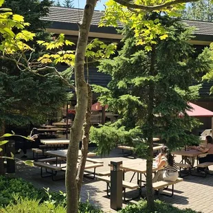 a woman standing in front of a restaurant