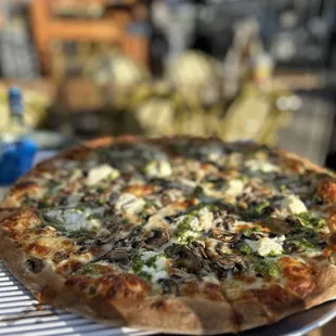 a whole pizza on a plate
