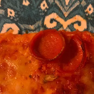 A REAL pepperoni! Curly and fried and not a slab of red salami!
