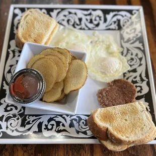 Ole man breakfast: eggs, home fries, sausage and toast