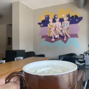  person holding a cup of coffee