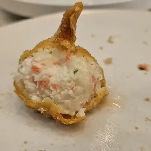 Inside crab rangoon is cream cheese, crab and maybe chives