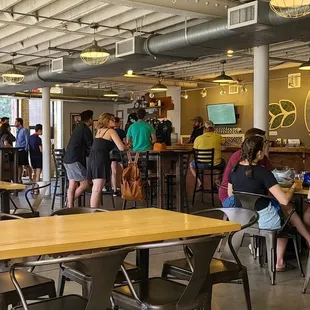 a large group of people sitting at tables