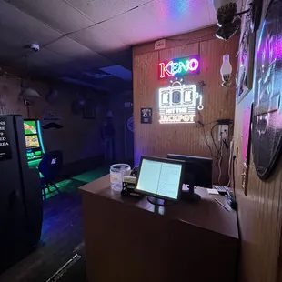 a bar with neon signs