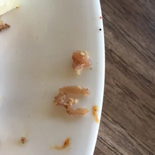 Close up of weird chewy cartilage bits I had to remove. *Way* more of these were present than any normal burgers I order, sadly.