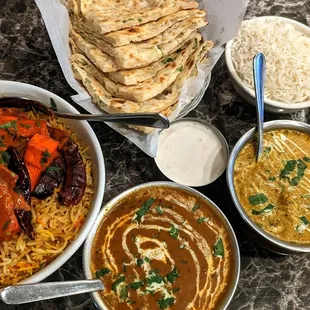 Onion Kulcha, Paneer Biryani, Malai Kofta, Dal Makhani, Raita