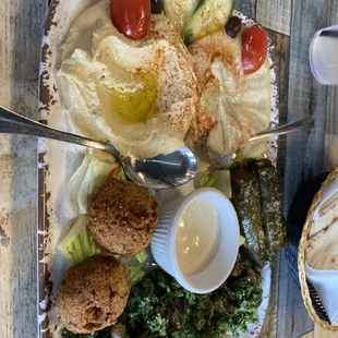 Baba ghanoush, grape leaves, falafel and tabouleh