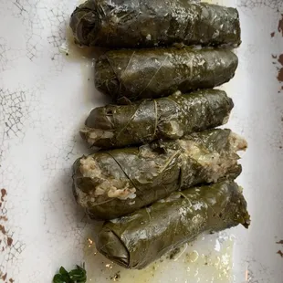 Meat and rice wrapped grape leaves