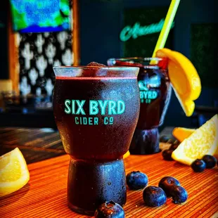 three glasses of cider ale