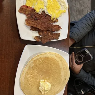 pancakes, bacon, eggs, and butter