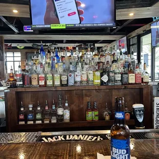 a beer bottle on the bar