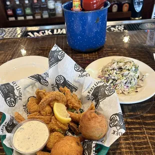 Fried Shrimp basket. I substituted the Killer Cole Slaw instead of potato chips. Comes with tarter and two hush puppies. $18