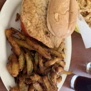 a burger and fries on a plate