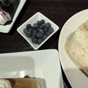 Blueberries that came with the giant cinnamon roll.