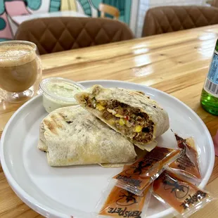 Chorizo breakfast burrito with green sauce