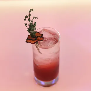 a drink with a butterfly on top