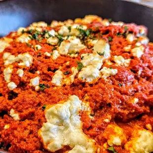Portabella + Quinoa Bowl w/harissa, tumeric cauliflower, zucchini. Very good, filling, and spicy!