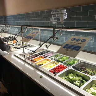 Wow, what a salad bar! Of course, gloves and hand sanitizer are provided.