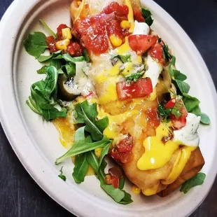 Smothered corned beef and hash breakfast burrito